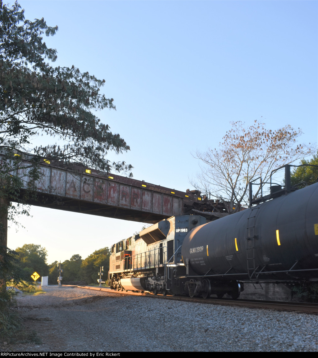 UP Western Pacific heritage unit going underneath SB CSX intermodal train